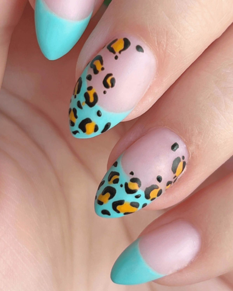taylor swift tloas showgirl french manicure with cheetah print nail art
