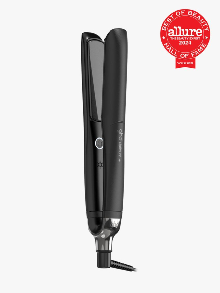 GHD Platinum+ Styler black flat iron on light gray background with red Allure Best of Beauty Hall of Fame seal in the top right corner